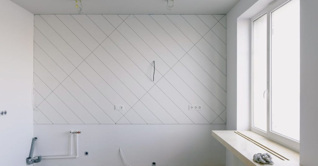 Modern room with renovation materials including cables and wooden floor, bright daylight streaming through the window.